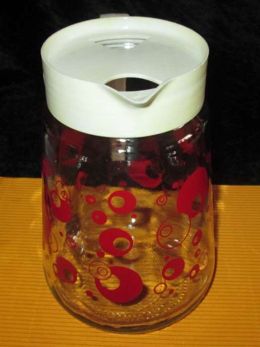 Home & Living-Kitchen ware-Consol Glass Jug with original plastic top. Reto vintage with red circle