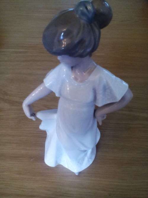 Nao figurine of a young lady.