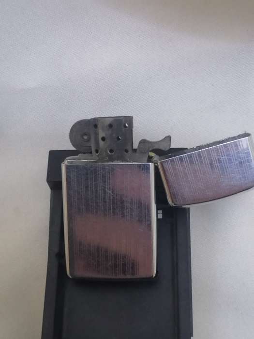 VINTAGE - ZIPPO LIGHTER IN ORIGINAL HOLDER - GOOD WORKING CONDITION - PLEASE READ BELOW.