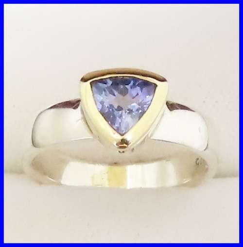 L@@K! BEAUTIFUL GENUINE TANZANITE RING SET IN SOLID NINE CARAT GOLD AND STERLING SILVER!