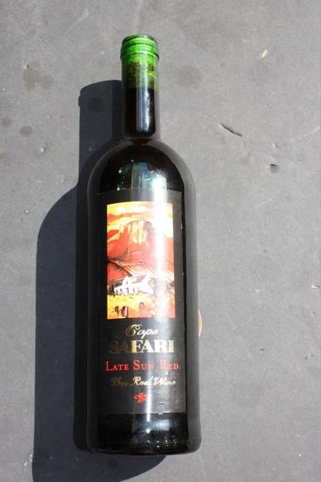 A BOTTLE OF CAPE SAFARI - LATE SUN RED - DRY RED WINE - A COLLECTORS ITEM