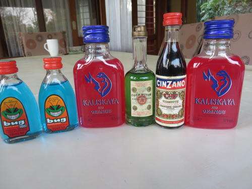 SIX VARIOUS FULL MINI GLASS BOTTLES - AS PER SCAN