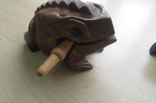2 WOODEN NOISE MAKING FROGS ,SORRY ONE PIN ONLY - AS PER SCAN