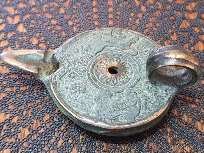 Antique Bronze Greek Oil Lamp showing the Griffin