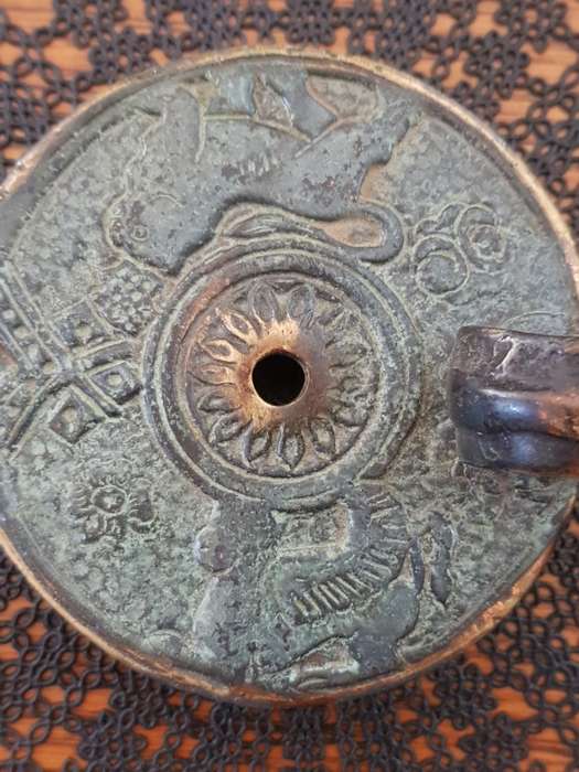 Antique Bronze Greek Oil Lamp showing the Griffin