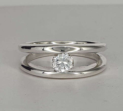 Silver tension style ring