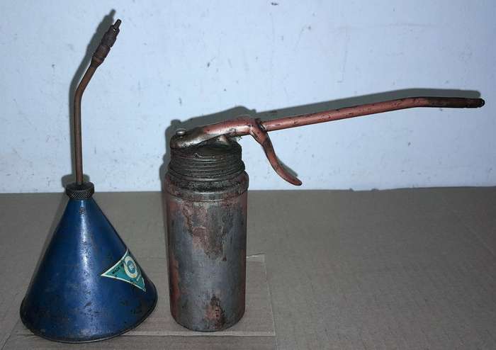 2 OIL DISPENSING CANS - SEE PICTURES