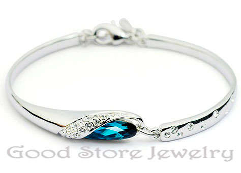 !!! last one in stock!!!BEAUTIFUL BLUE TOPAZ SWAROVSKI BRACELET IN 18K WHITE GOLD CLAD