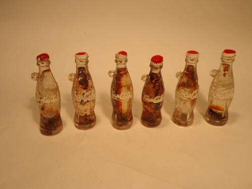 Coca Cola - A veriety of Miniature Coke Bottles