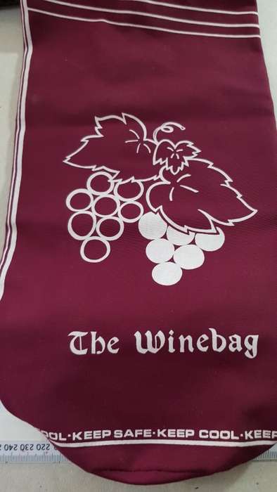 Cloth wine bottle carrier. The Winebag