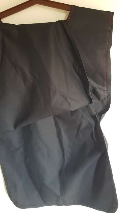 Pinafore type double sided apron. Black