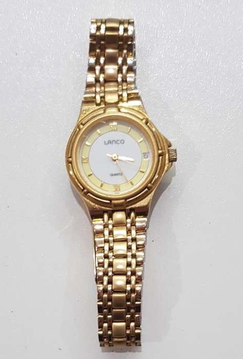 Ladies Lanko Quartz wrist watch. c1990s.  Gold plated with round face and original strap and clasp.