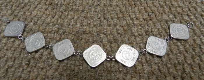 Coin Bracelet made with 7x quadrangular 5 cent pieces from the Netherlands. Made after Second World