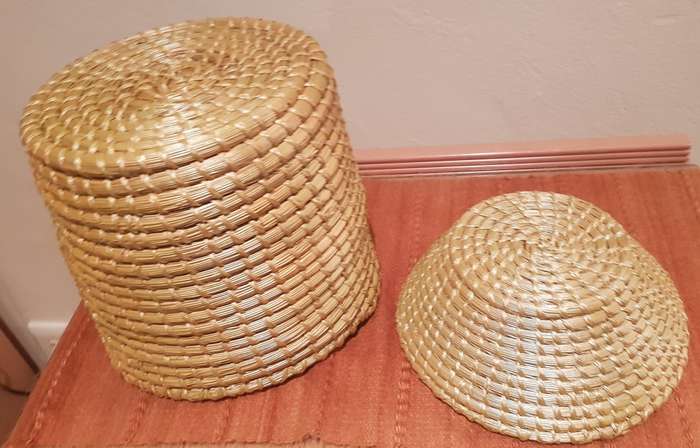 African Woven display baskets. Set of 2x Handmade woven baskets made with natural materials.