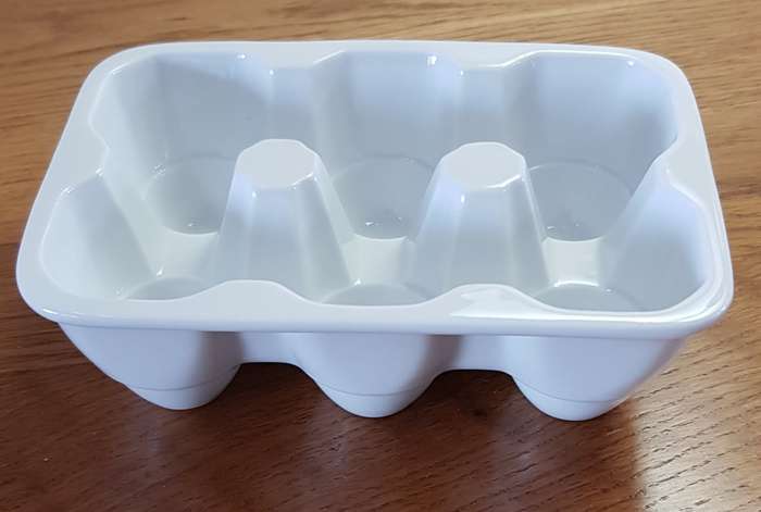White Novelty porcelain egg holder. Takes 6x Jumbo size eggs.