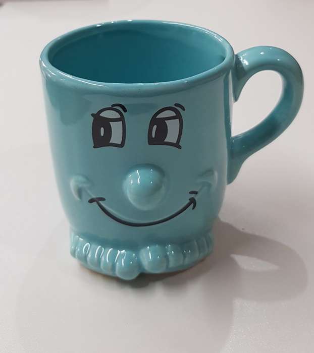 Novelty Ceramic Mug  Aqua blue mug with toes, nose and mouth