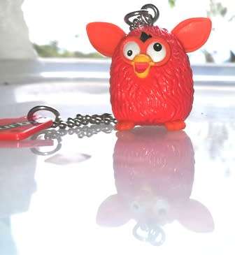 Collectable Small Furby key holder with chain.  Rare little toy!  3.5cm.