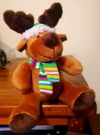 Pep the Moose with a stripey Christmas hat and scarf. 32cm.