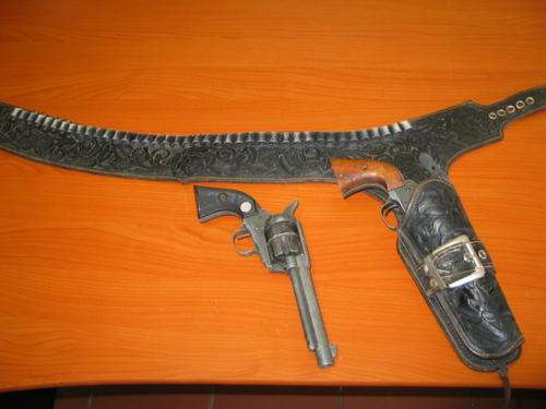 Stunning Cowboy holster and two replica 45 colts