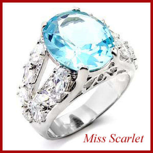 SIMULATED AQUAMARINE AND SIMULATED DIAMOND RING - SIZE 10