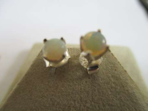 A Pair of Sterling Silver and Australian Opals Earrings