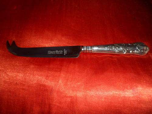 GORGEOUS SILVER HANDLED CHEESE KNIFE
