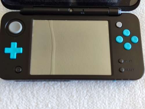 Nintendo 2ds xl with original charger and memory card