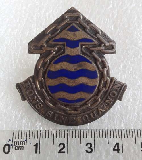 SADF Ordinance Service Corps Cap Badge. Lugs intact.