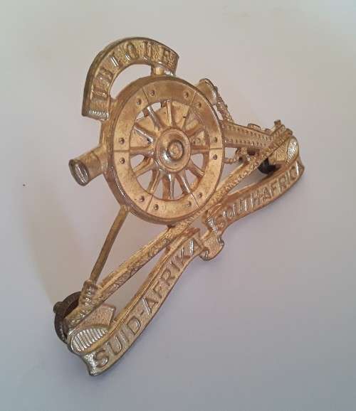 South African Field Artillery Cap Badge. Lugs Intact.