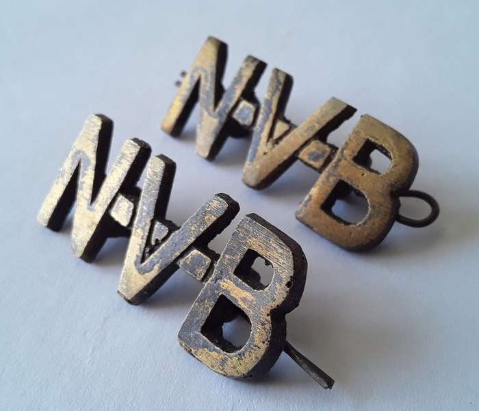 Pair SA WW2 National Volunteer Brigade Shoulder Titles. Lugs Intact.