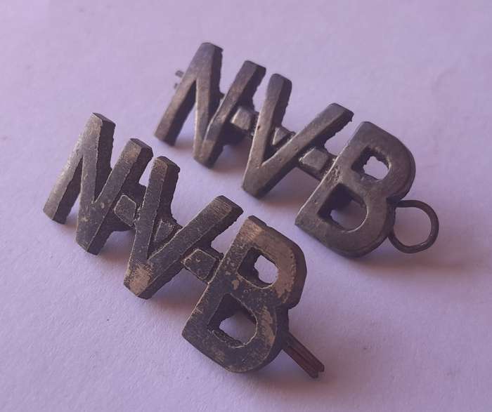 Pair SA WW2 National Volunteer Brigade Shoulder Titles.  Lugs Intact.