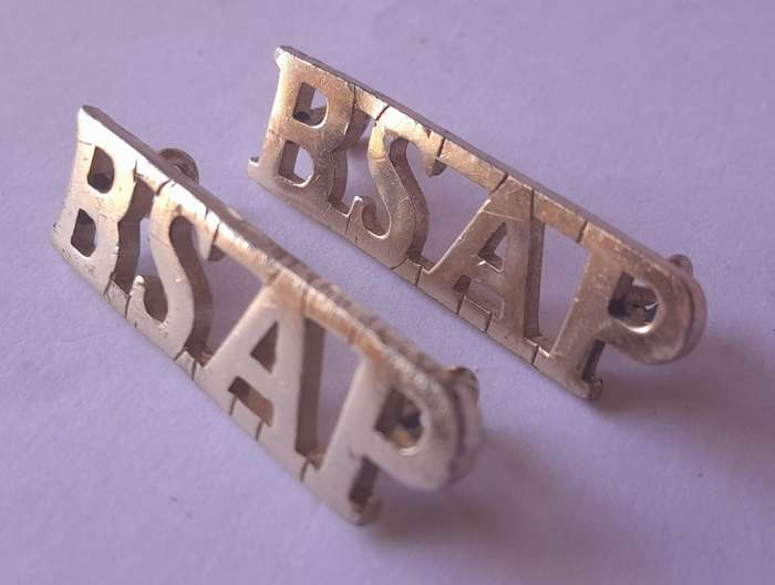 Pair Rhodesia BSAP (British South African Police) Shoulder Titles. Lugs intact.