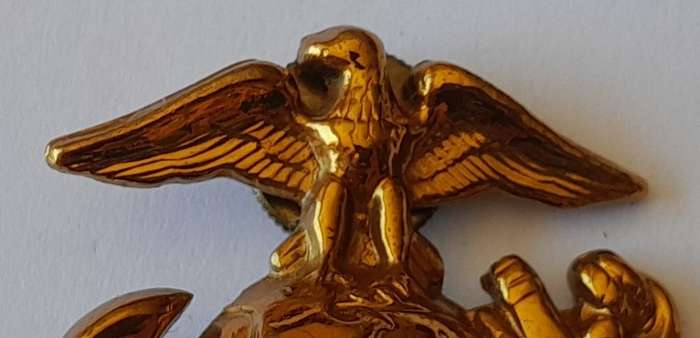 WW2 US Marine Corps Cap Badge.
