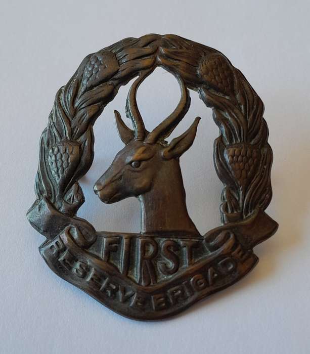 WW2 SA First Reserve Brigade Cap Badge. Bronzed Brass. Lugs Intact.