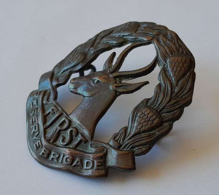 WW2 SA First Reserve Brigade Cap Badge. Bronzed Brass. Lugs Intact.