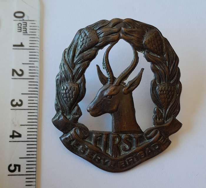 WW2 SA First Reserve Brigade Cap Badge. Bronzed Brass. Lugs Intact.