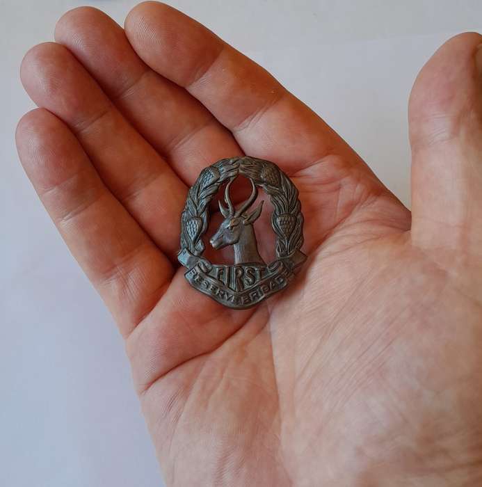 WW2 SA First Reserve Brigade Cap Badge. Bronzed Brass. Lugs Intact.