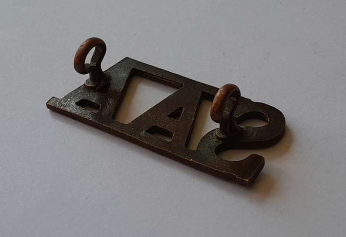 South Africa Army Artillery Brass Title. Lugs Intact.