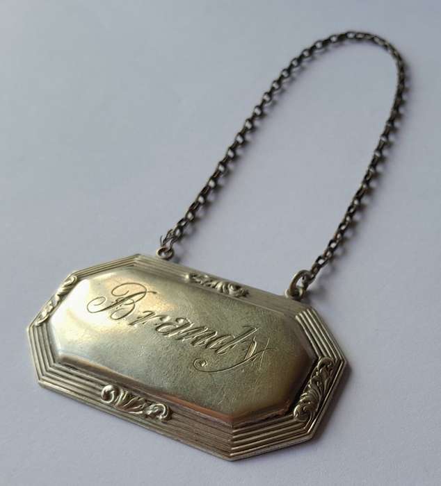 Vintage `Brandy` Decanter Label. Stamped `D&A`.