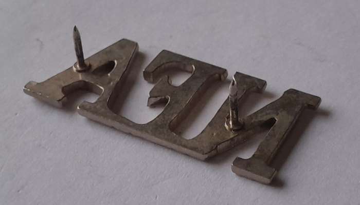 Natal Field Artillery Shoulder Title.  Pins Intact.