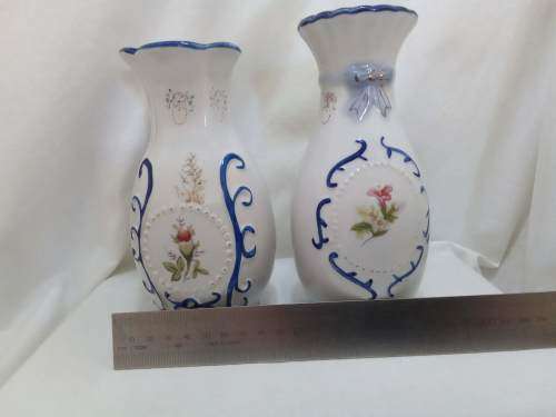 Pair of vintage vases in white and blue porcelain