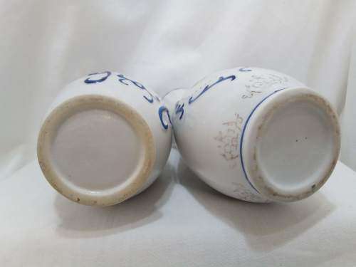Pair of vintage vases in white and blue porcelain