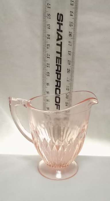 Stunning vintage milk jug in lovely peachy pink glass