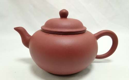 An exquisite small vintage purple clay teapot by master Zhang Jing