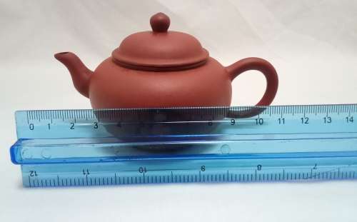An exquisite small vintage purple clay teapot by master Zhang Jing