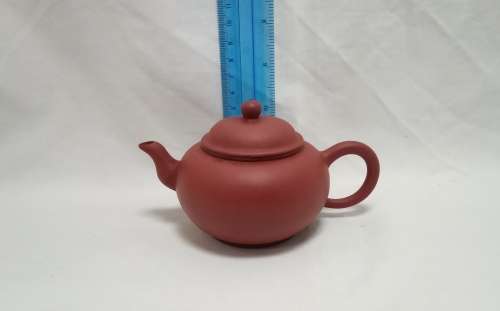 An exquisite small vintage purple clay teapot by master Zhang Jing