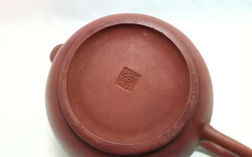An exquisite small vintage purple clay teapot by master Zhang Jing