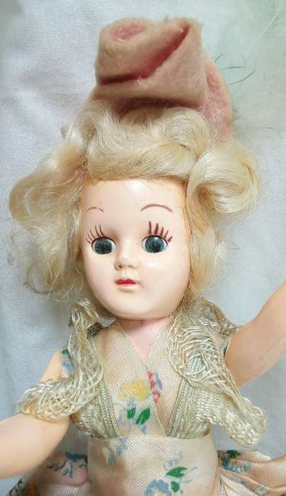 Beautiful vintage "sleepy eye" fashion doll with original dress