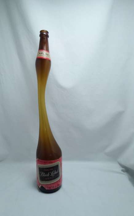 Most unusual vintage Black Label Stretched glass bottle