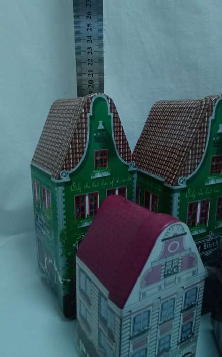 Lovely collection of little house tins in excellent condition